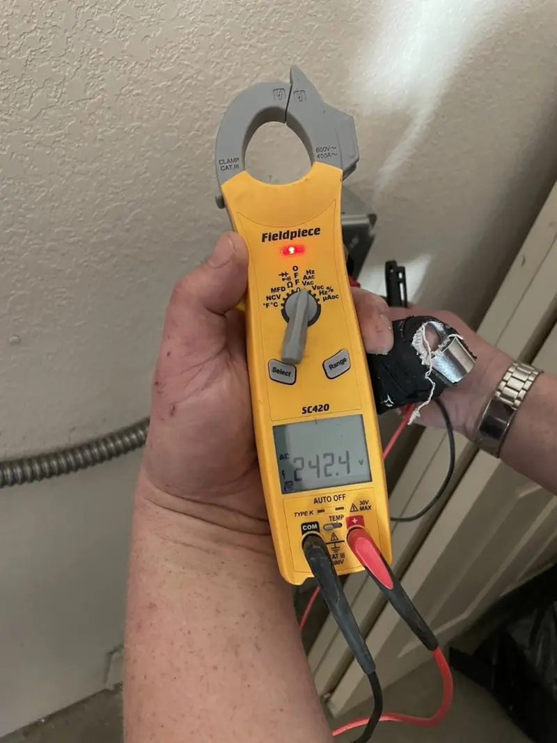 Voltage testing with clamp meter during Circuit Breaker Repair in Grosse Pointe